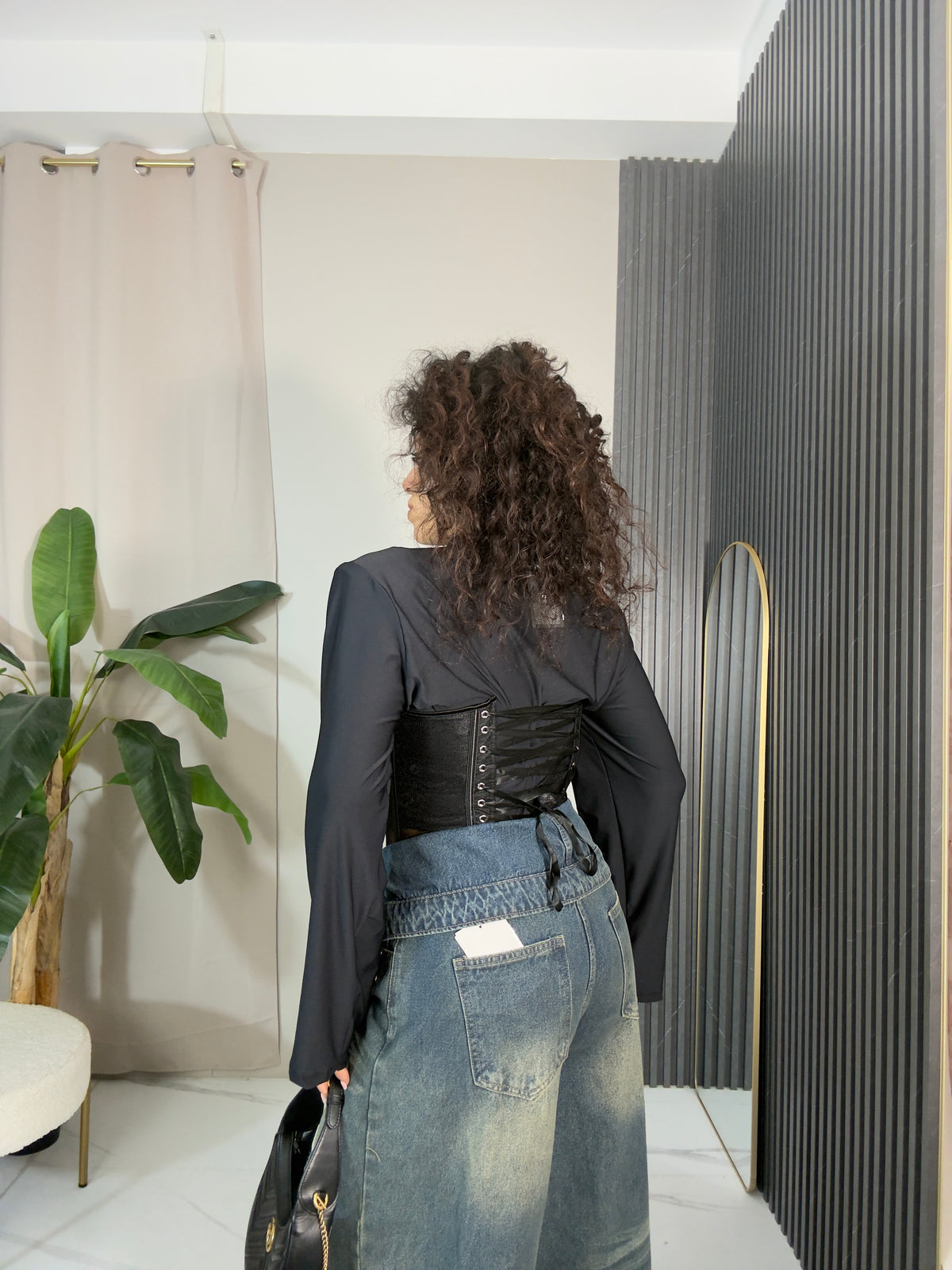 Corpetto in pizzo nero