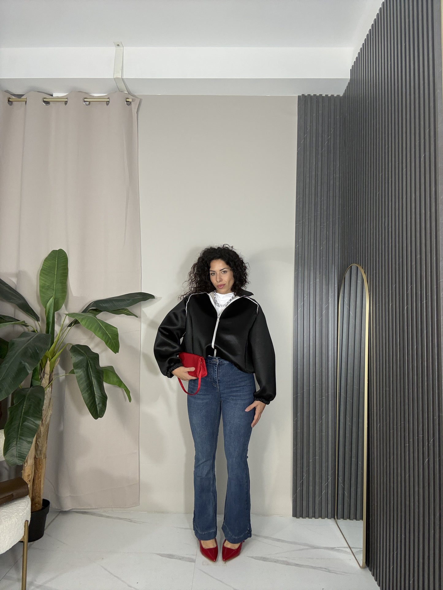Jeans elasticizzato a zampa