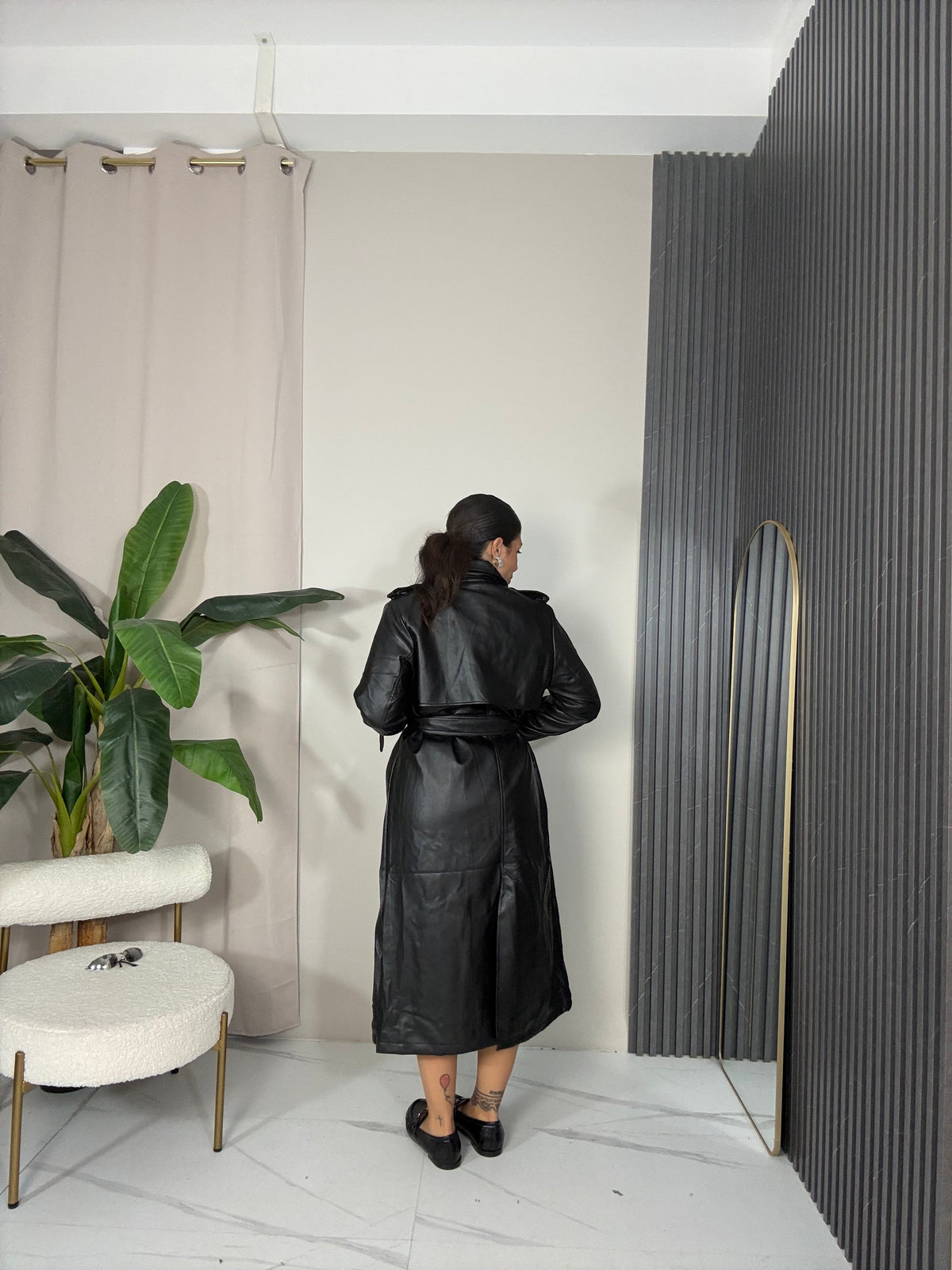 Trench in pelle